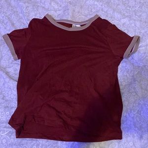 a red and white short sleeve shirt.